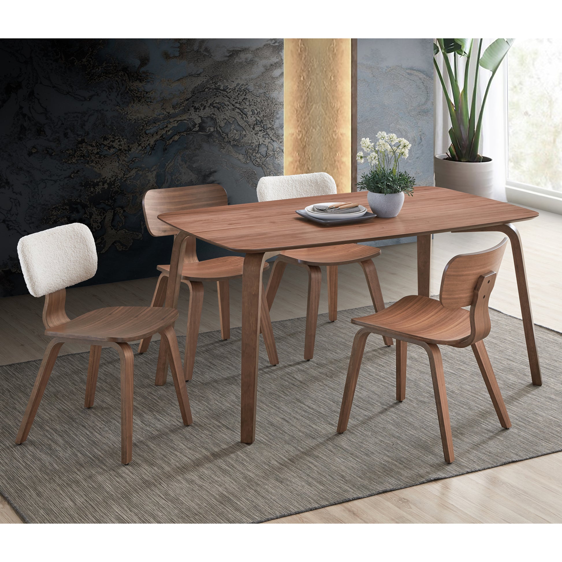 Midcentury modern walnut dining table with curved wooden chairs seating four