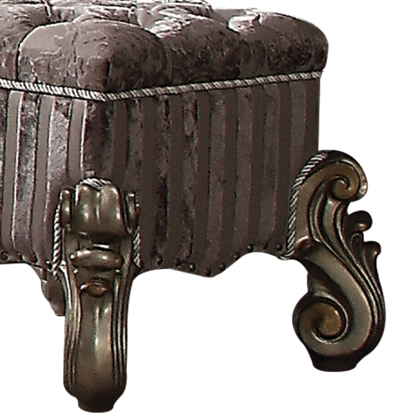 Ornate dark brown tufted ottoman with decorative carved legs and rope trim