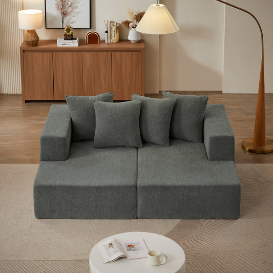 Modular charcoal gray fabric sectional sofa with plush cushions for comfortable living room seating