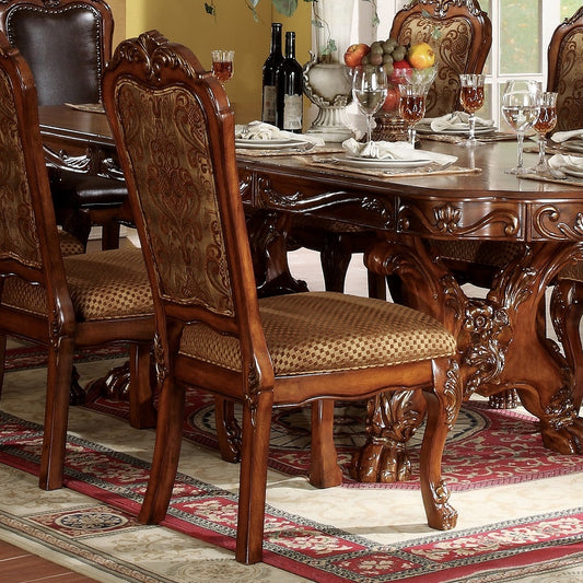 Ornate carved wood dining chair with damask fabric seat and backrest