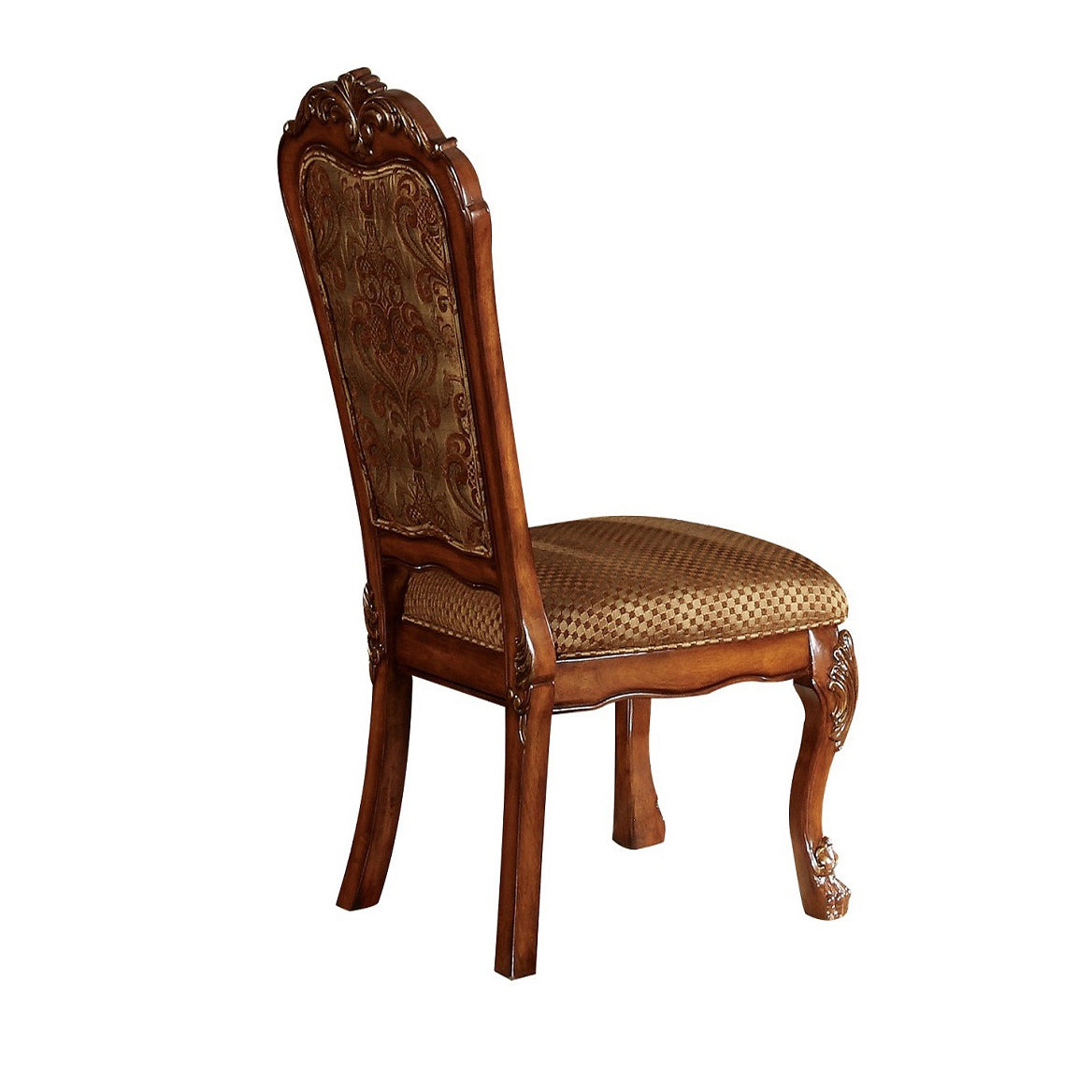 Ornate wooden dining chair with detailed damask upholstery