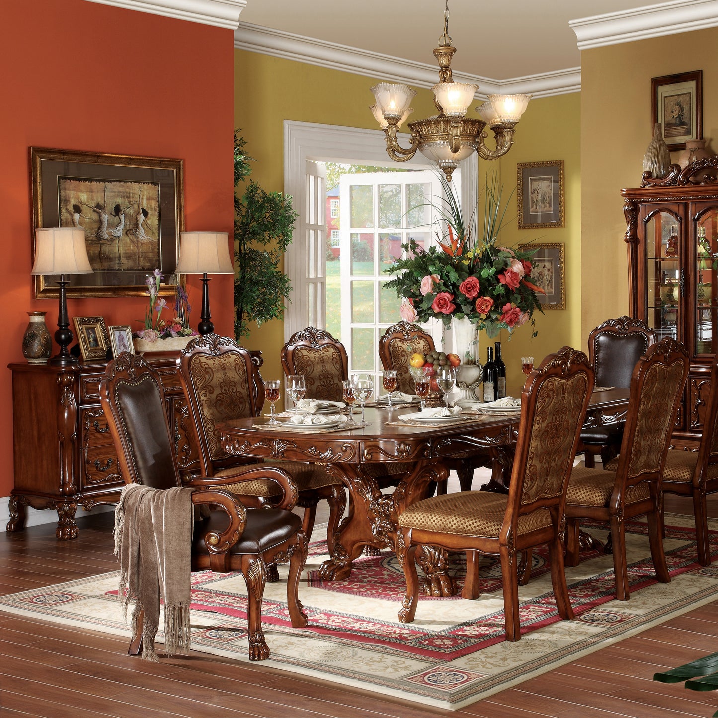 Ornate mahogany dining set with upholstered chairs and detailed woodwork