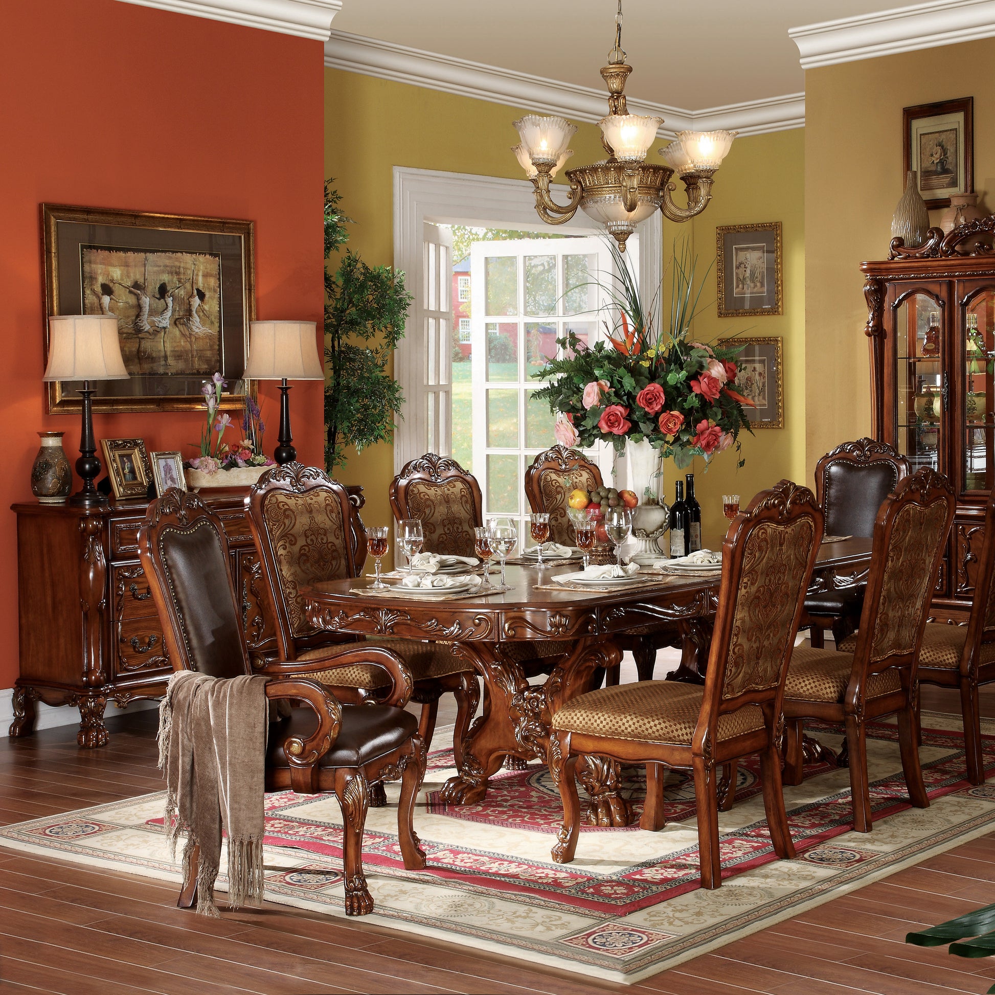 Ornate mahogany dining set with upholstered chairs and detailed woodwork