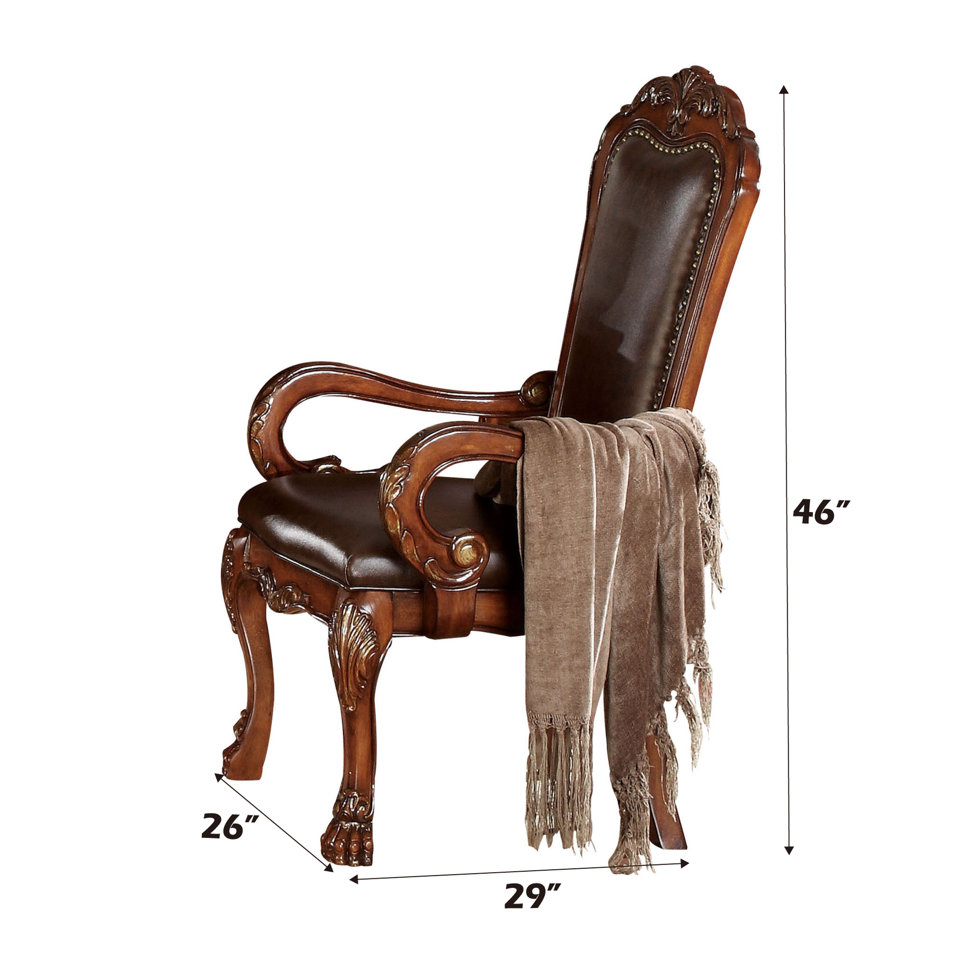 Ornate dark brown leather armchair with carved wooden accents and nailhead trim