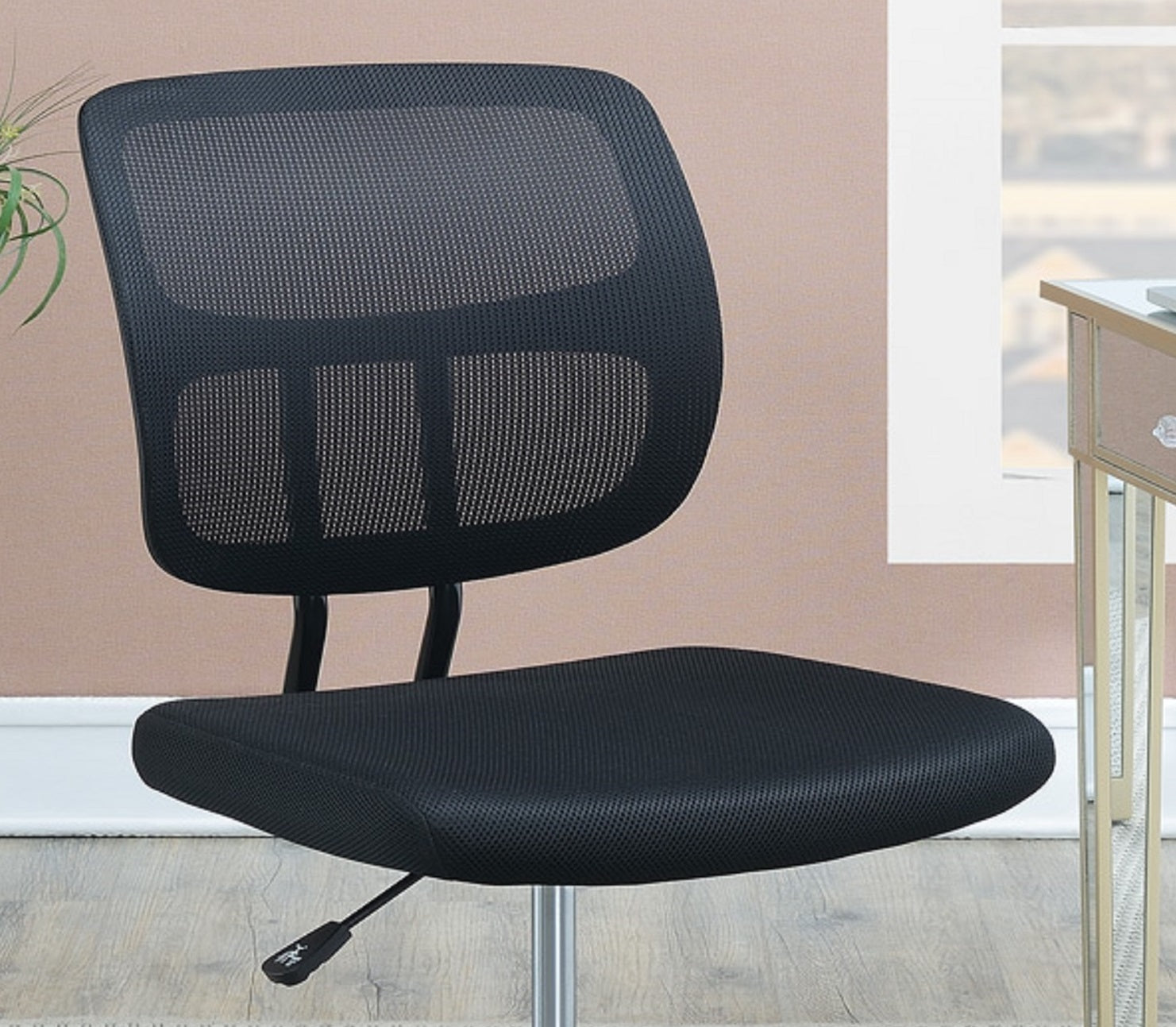 Black mesh task chair with ergonomic back support for comfortable office seating