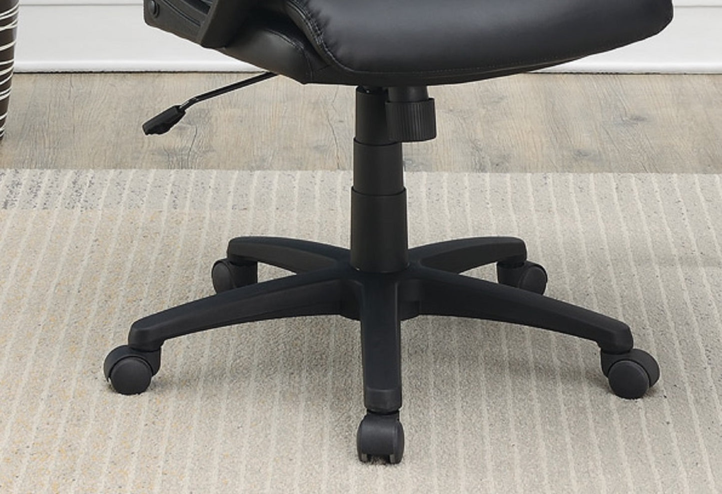Black ergonomic office chair base with five castor wheels