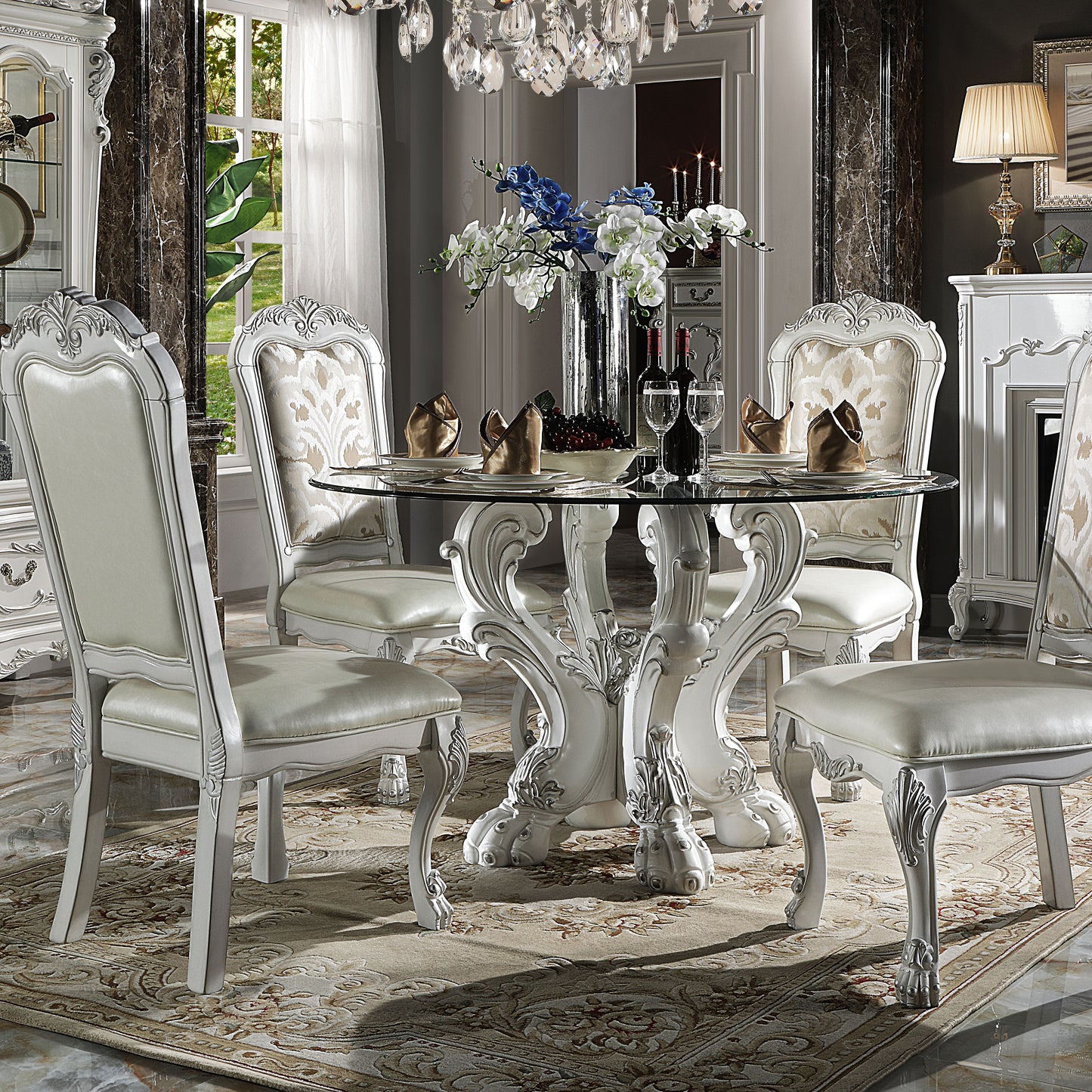 Elegant white leather dining chair with ornate carved legs for a luxurious dining room