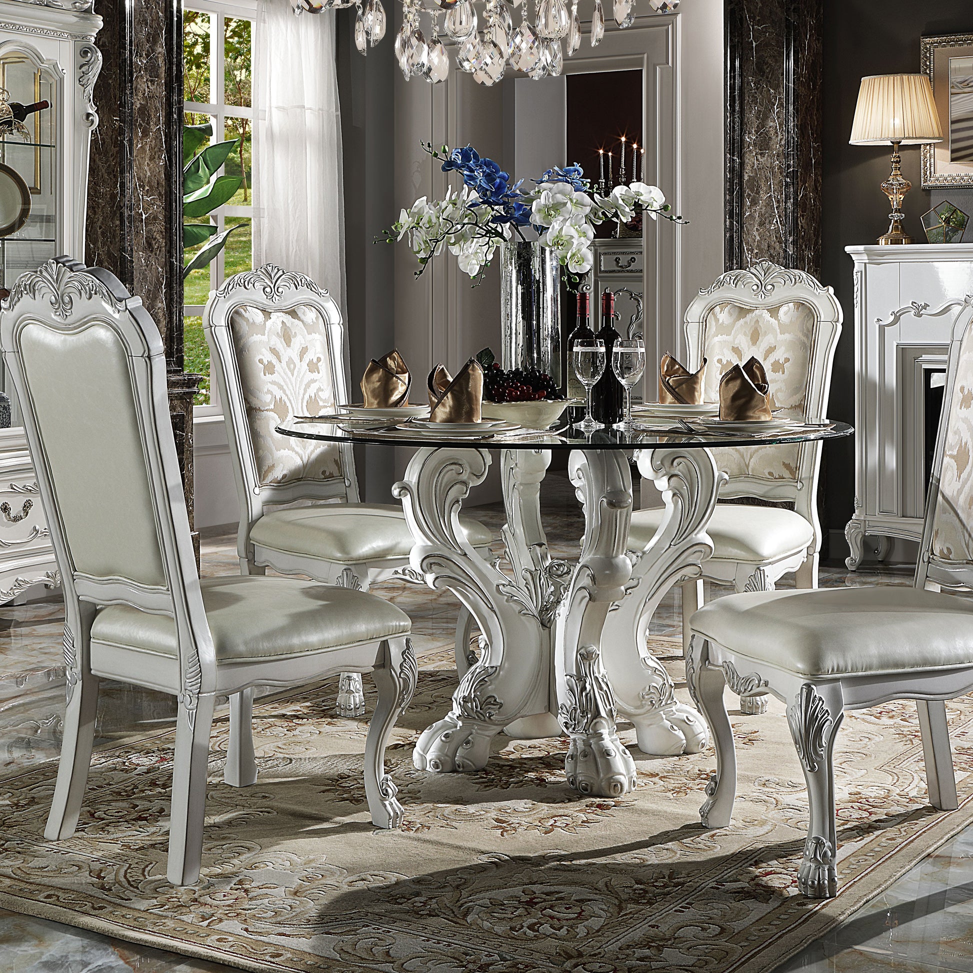Elegant white leather dining chair with ornate carved legs for a luxurious dining room