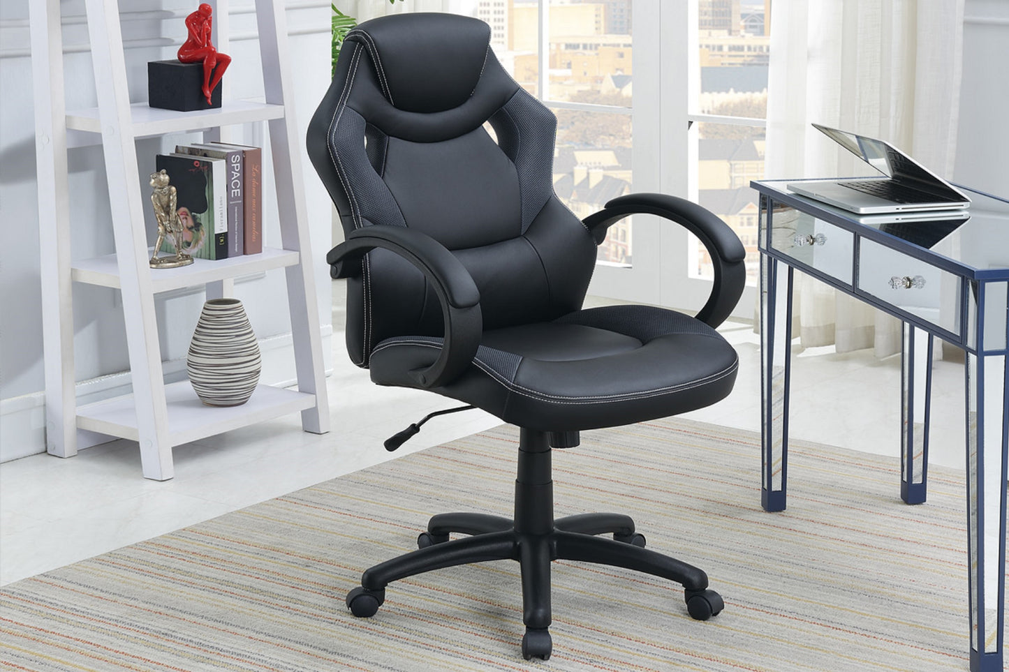 Black ergonomic office chair with white stitching detail and mesh accents