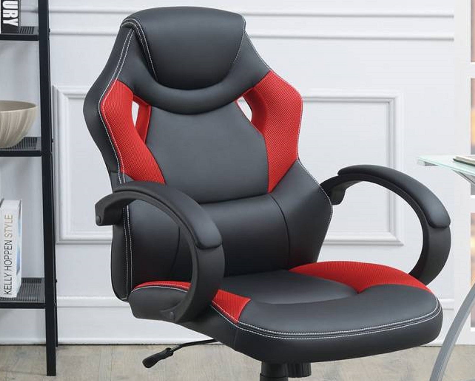 Black and red ergonomic gaming chair with white stitching ideal for long sessions