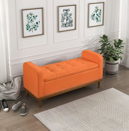 Orange tufted storage bench with wooden legs