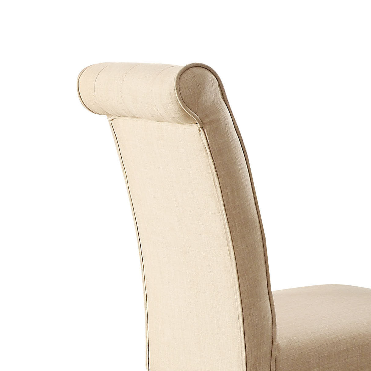 Closeup of a natural linen upholstered dining chair with a rolled top detail