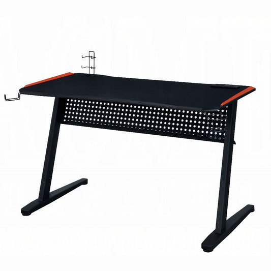 Black gaming desk with perforated front and orange accents ideal for PC setups