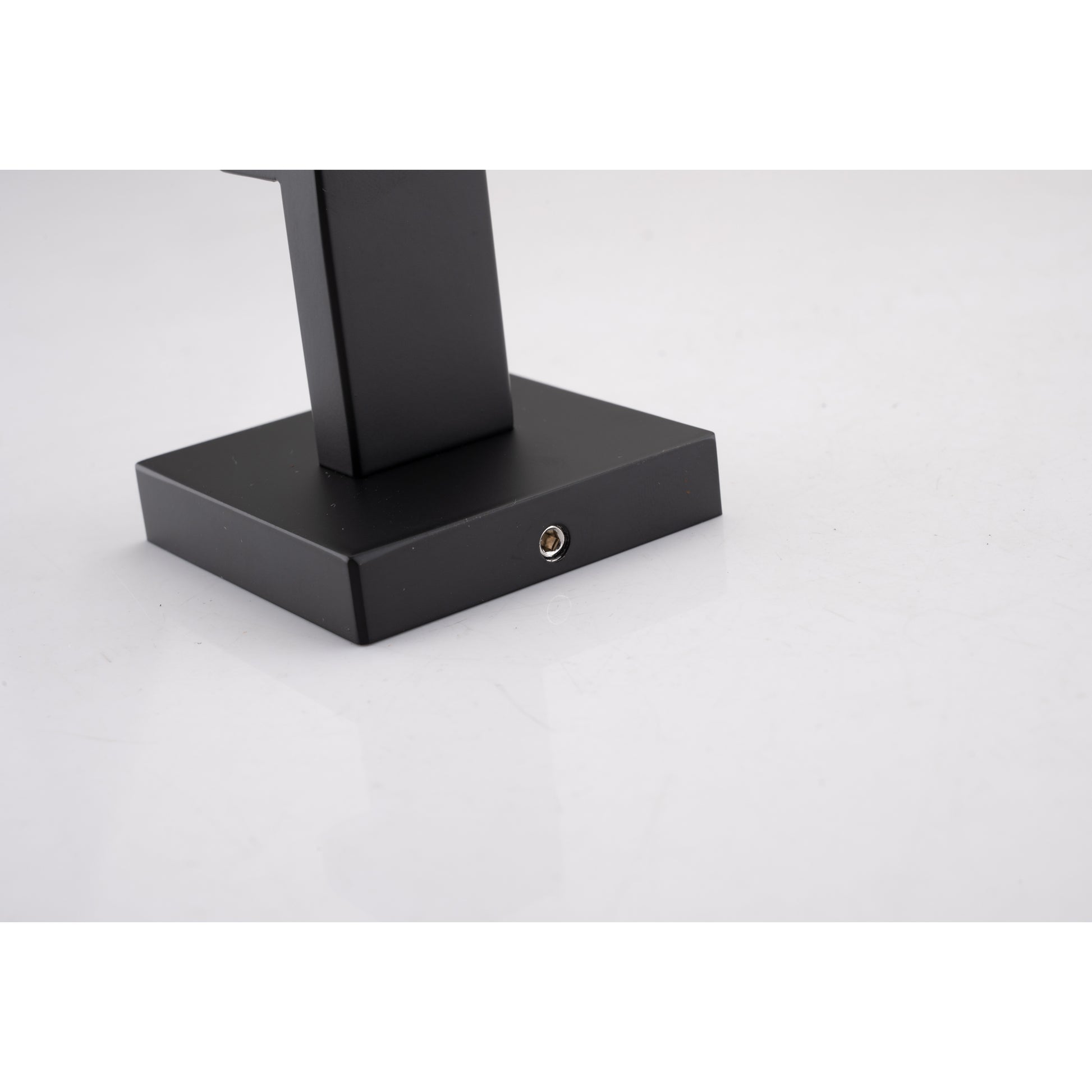 Black modern desk lamp base with screw detail minimalist design