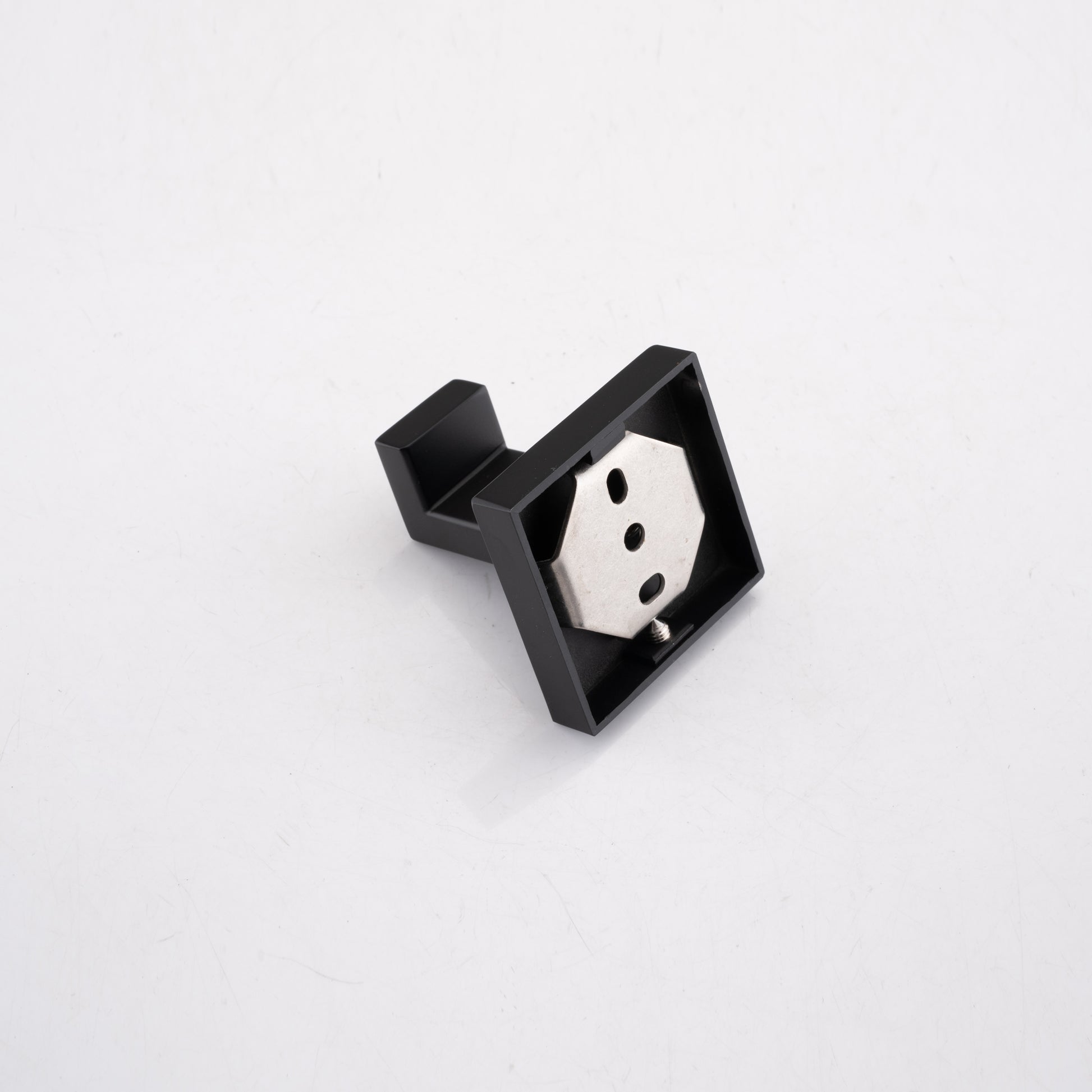 Modern black wallmounted coat hook with a brushed metal base