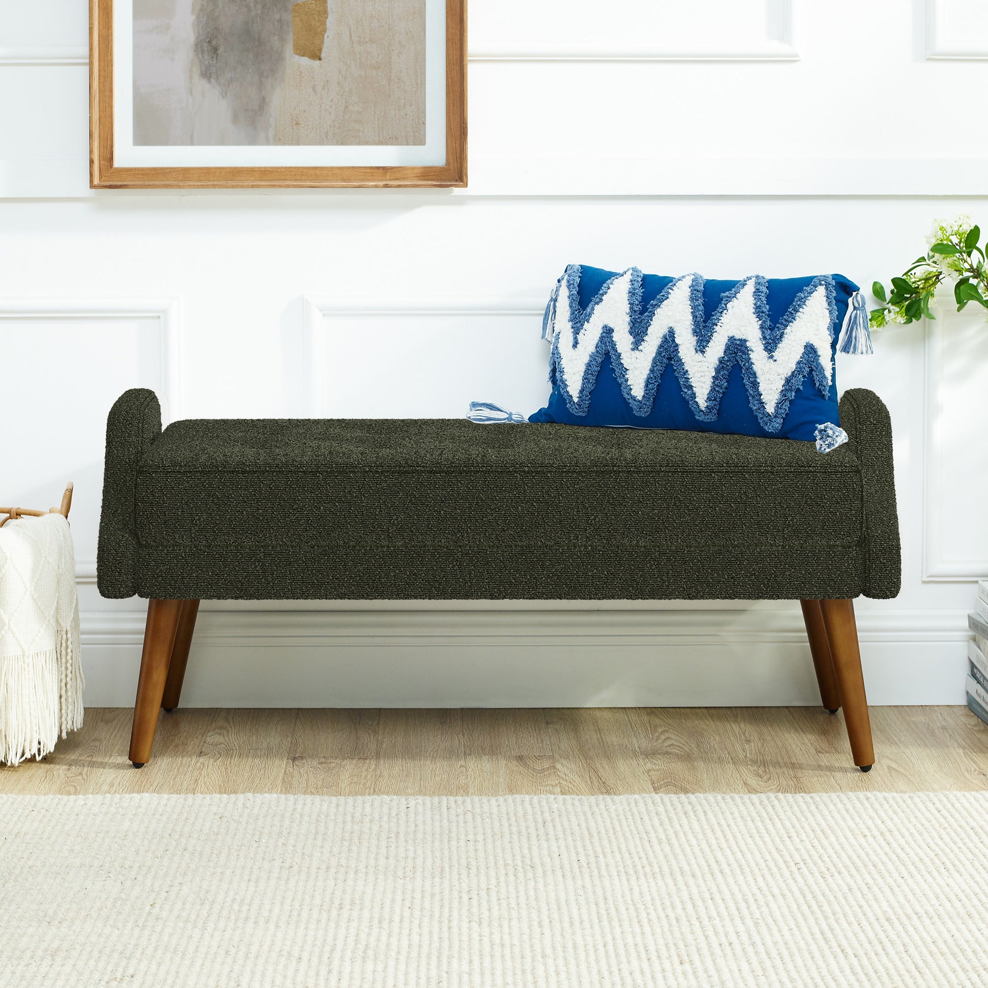 Dark green upholstered bench with wooden legs