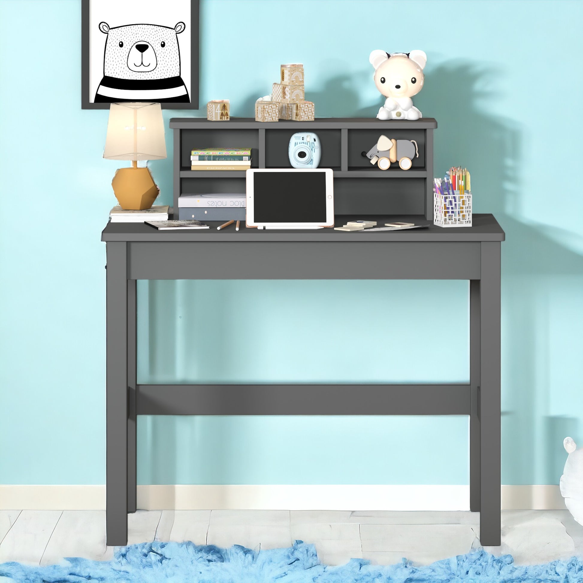 Dark gray wooden desk with a modern design perfect for a childs study area
