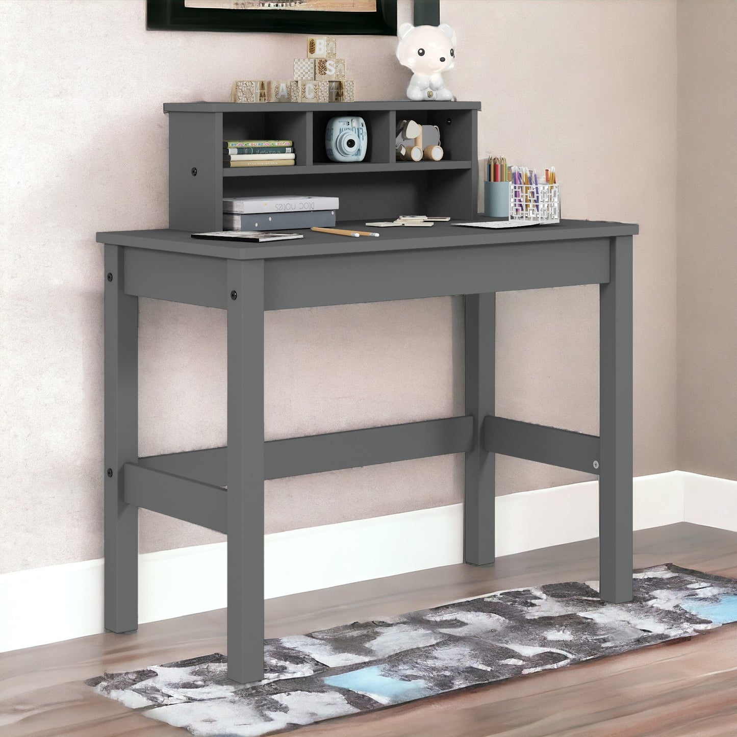 Grey wooden kids desk with hutch and storage for books and stationery