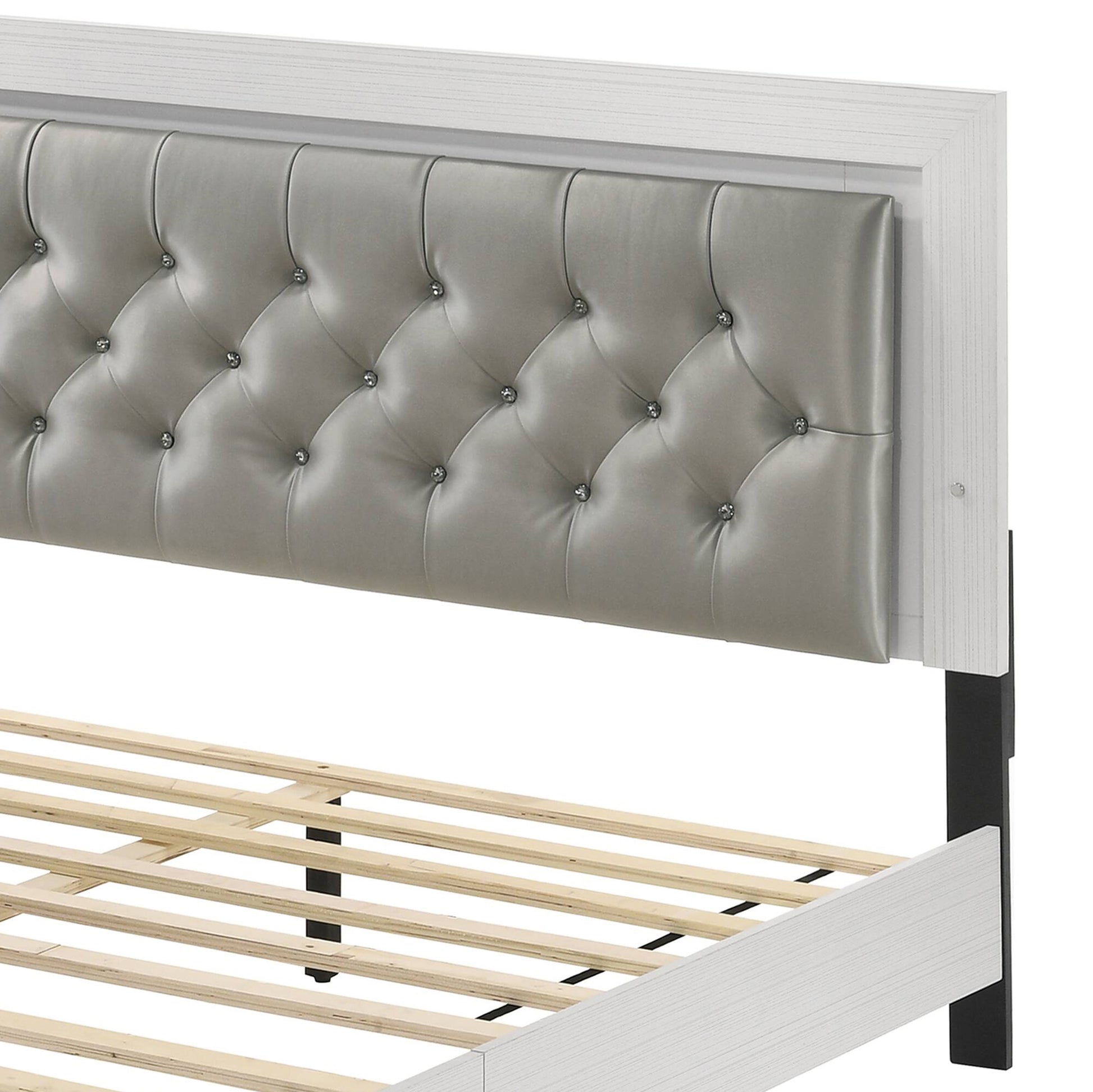 Gray tufted faux leather headboard with crystal accents and white wood frame