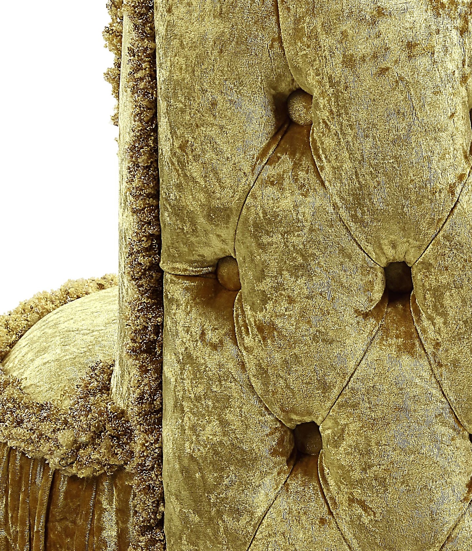Textured gold velvet armchair with tufted back and ornate trim