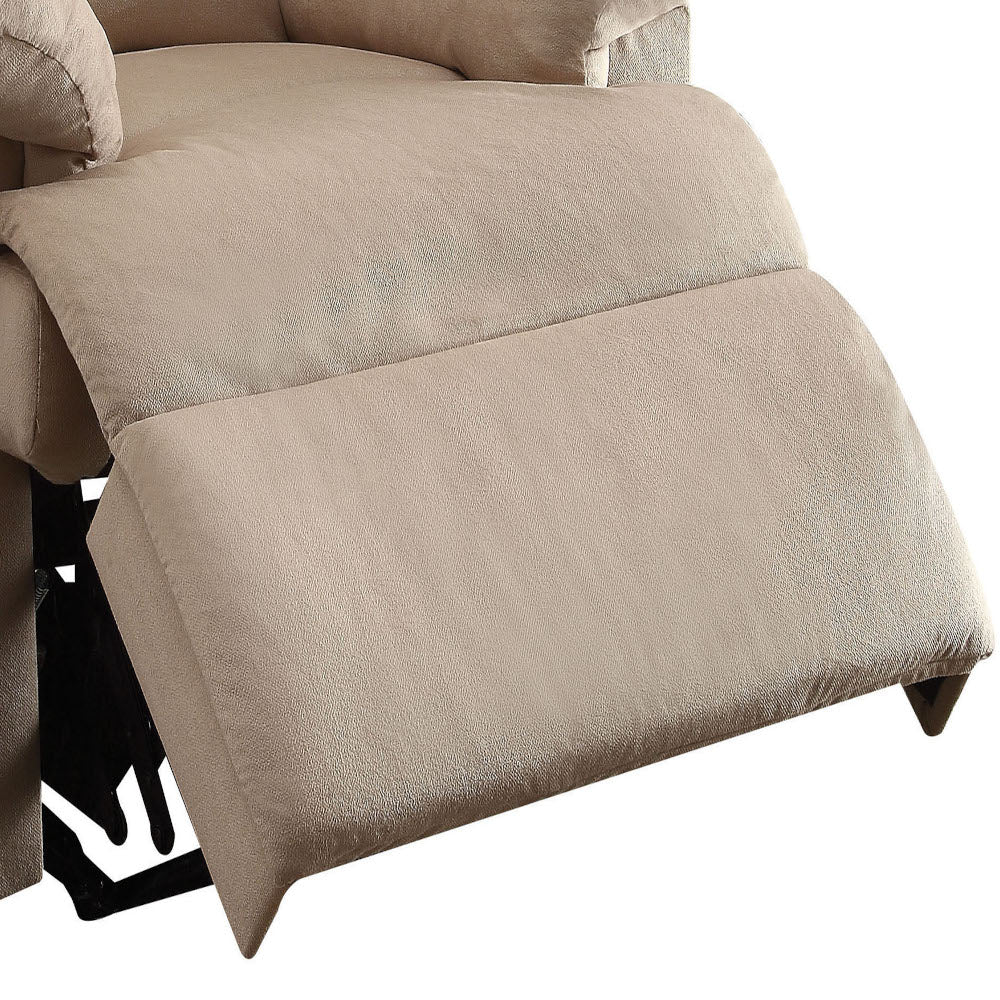 Beige fabric recliner footrest extended showing plush cushioning and sturdy metal mechanism