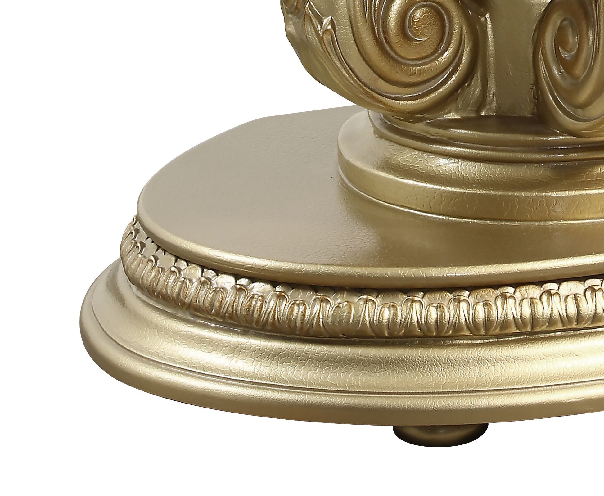 Elegant gold ornate pedestal base with scrolling details perfect for display stands