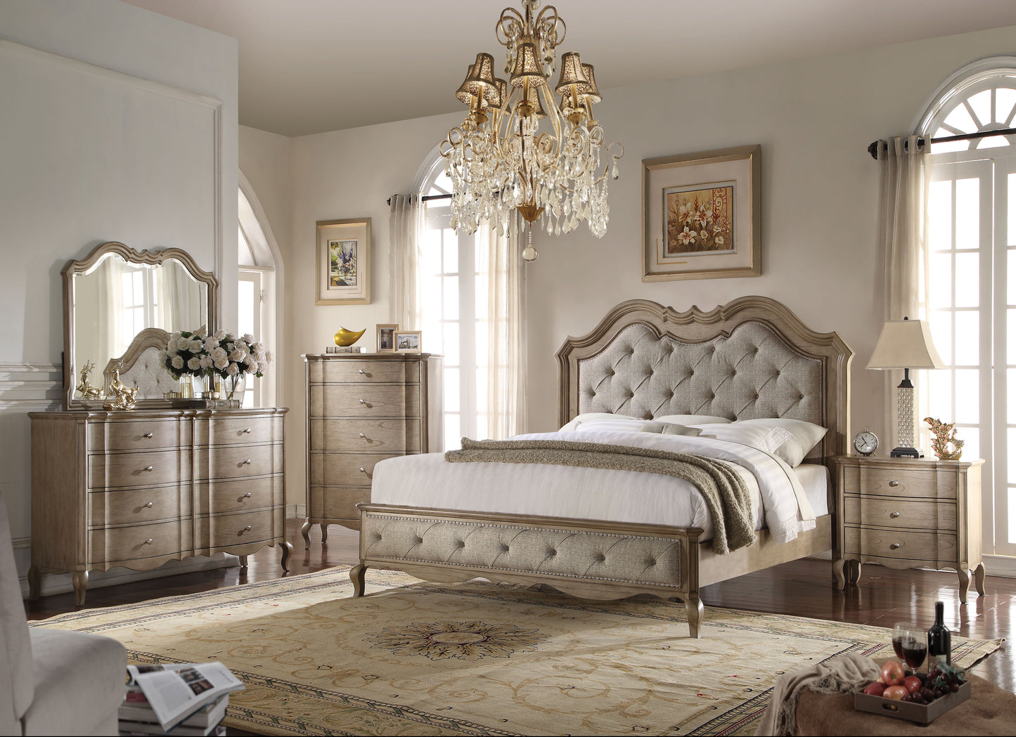 Tufted upholstered bed frame with carved wood details featuring a beige linenlook fabric and decorative nailhead trim for a luxurious bedroom set