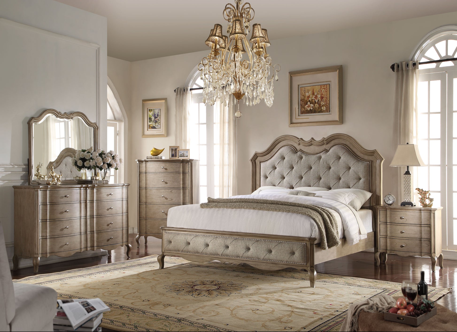 Tufted upholstered bed frame with carved wood details featuring a beige linenlook fabric and decorative nailhead trim for a luxurious bedroom set