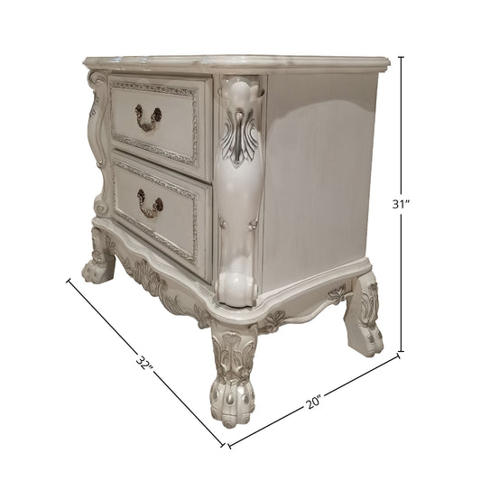 Ornate antique white nightstand with two drawers and detailed carvings