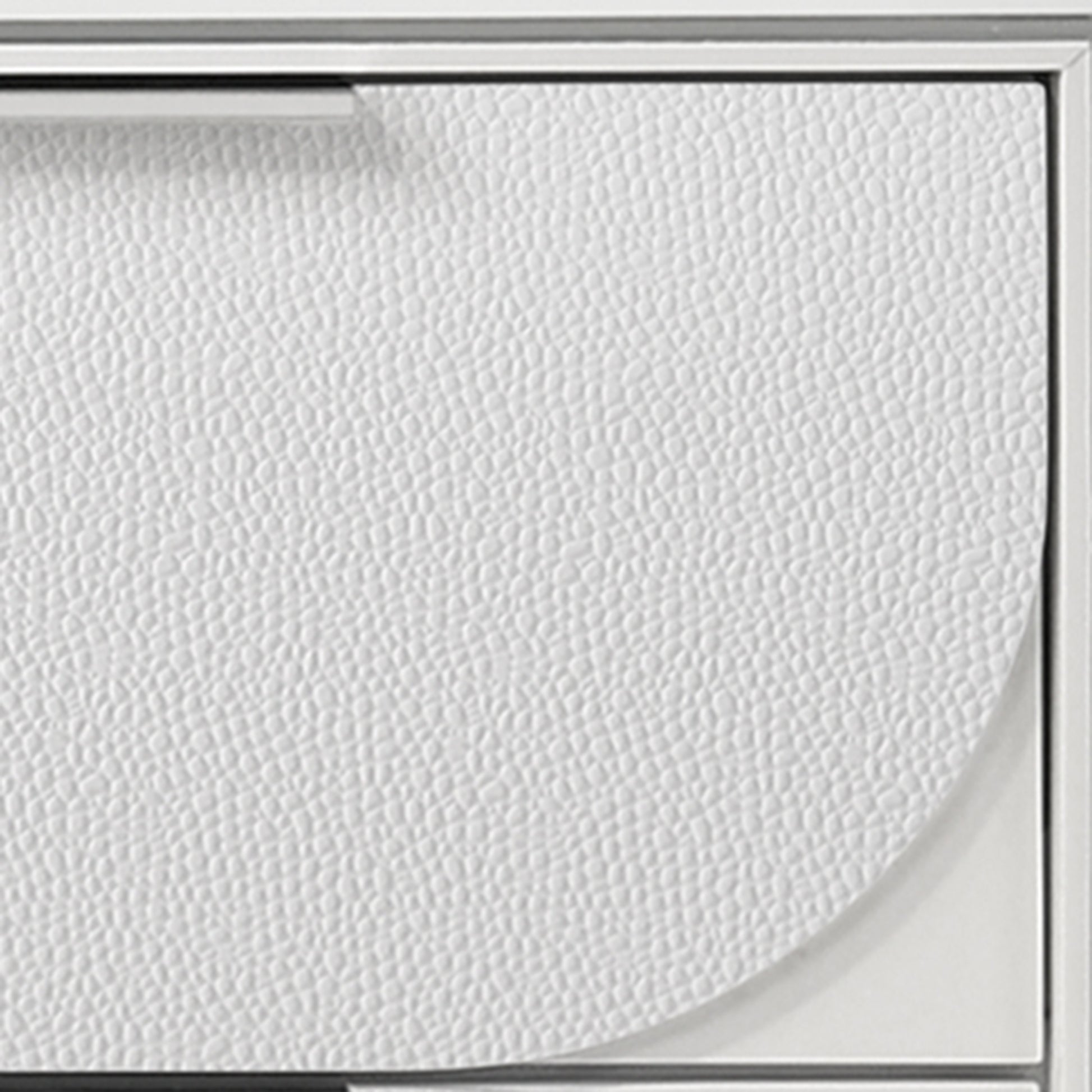 White textured drawer front with subtle dimple pattern