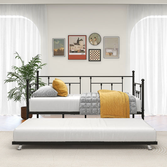 Black metal twin daybed with trundle grey star quilt yellow pillows and knit throw