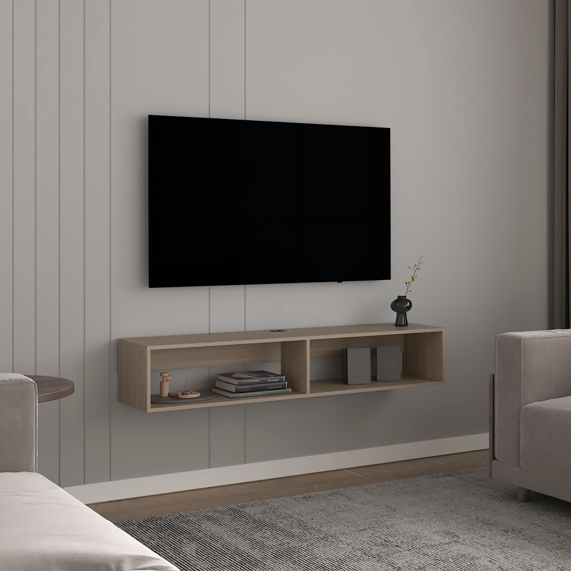 Floating oak media console with two open compartments and decorative items