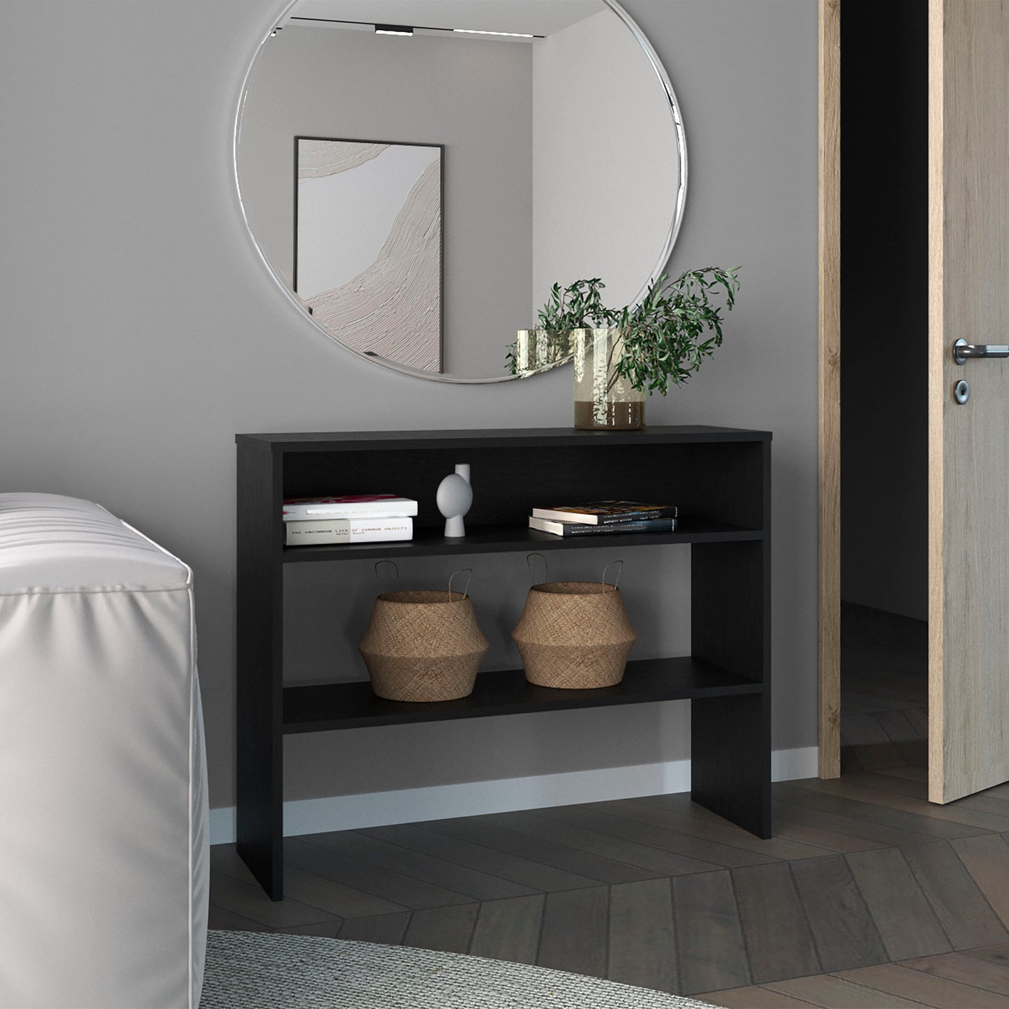 Black twoshelf console table with decorative baskets and books for entryway storage