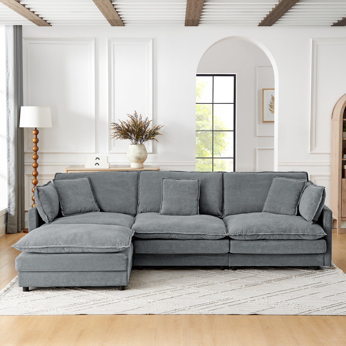 Deep grey sectional sofa with plush cushions and textured fabric perfect for modern living rooms