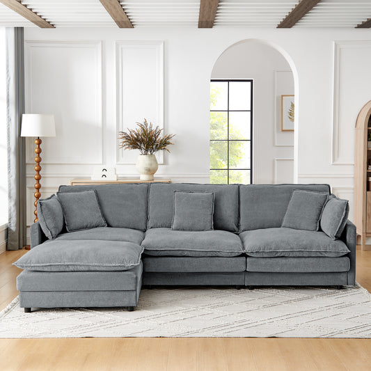 Deep grey sectional sofa with plush cushions and textured fabric perfect for modern living rooms