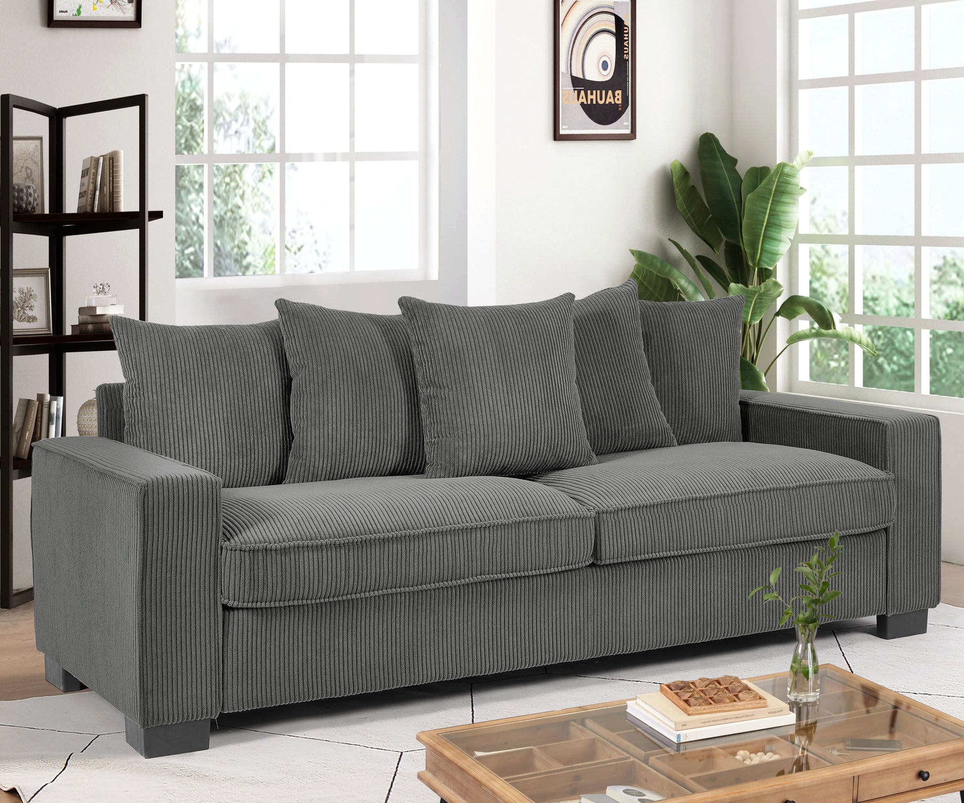 Dark gray corduroy sofa with plush cushions perfect for modern living rooms