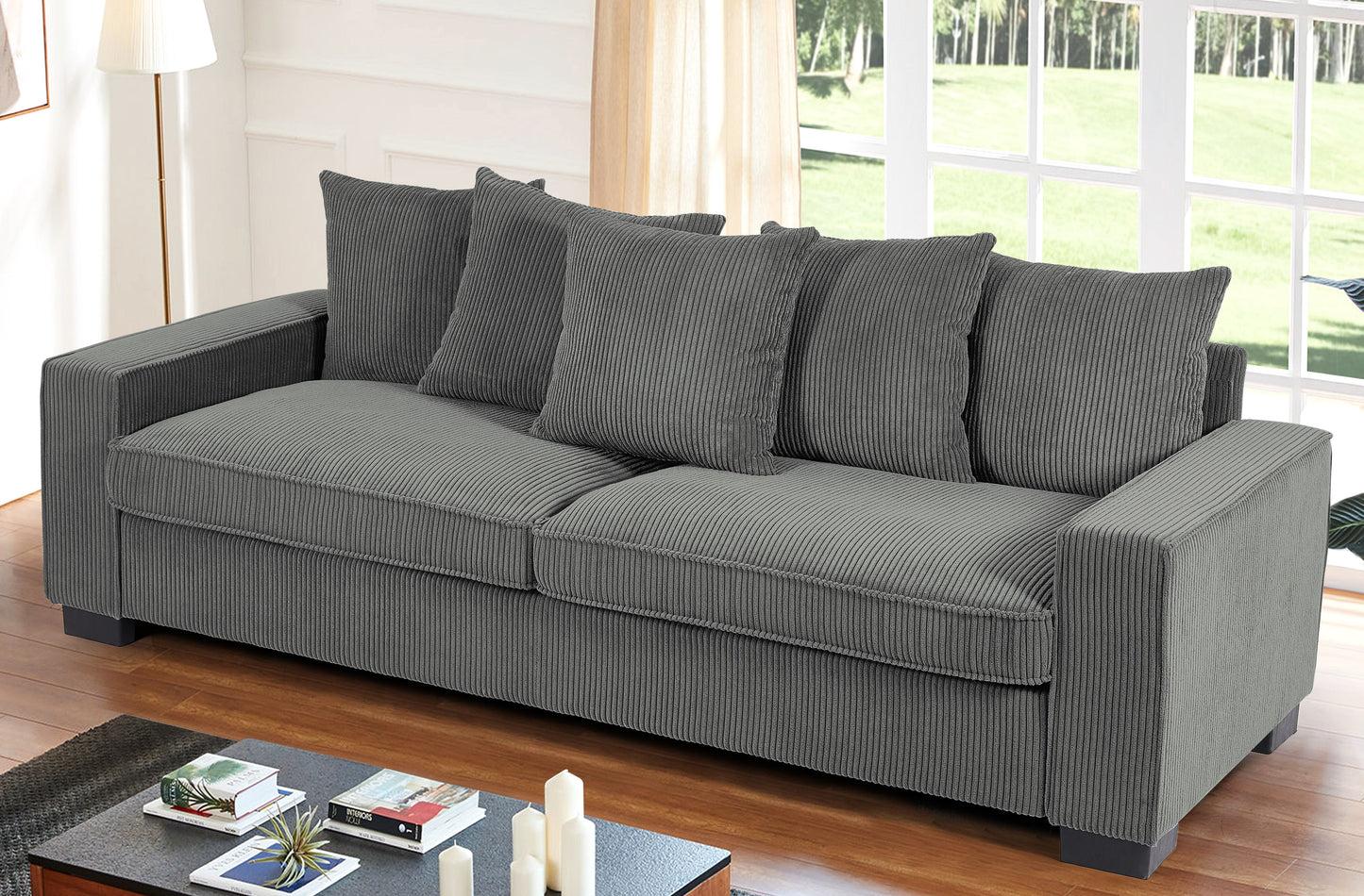Comfortable grey corduroy sofa with plush cushions ideal for living rooms