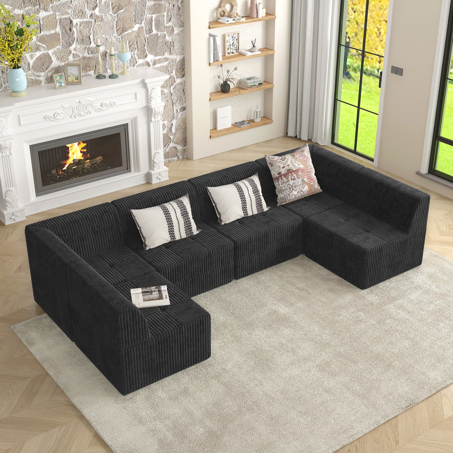 Dark gray corduroy sectional sofa with modular cubic seating and neutral throw pillows