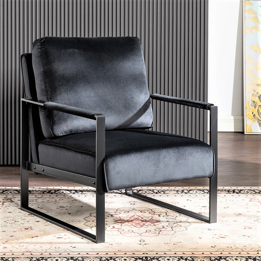 Plush black velvet armchair with a modern matte black metal frame