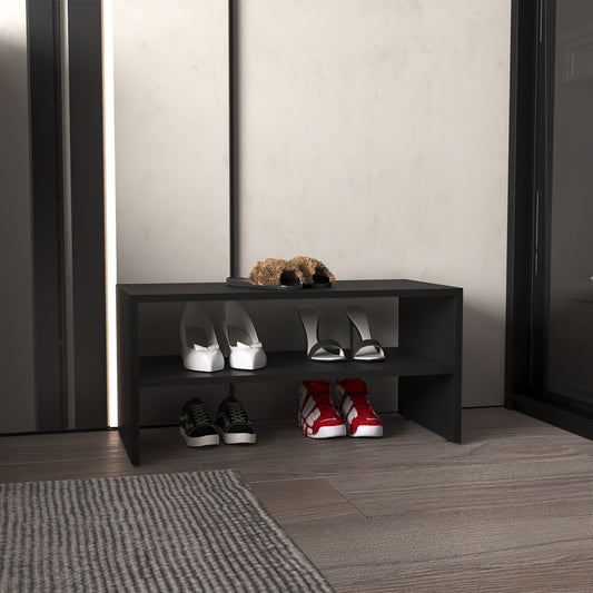 Stylish black shoe rack holding white heels black sandals and red sneakers