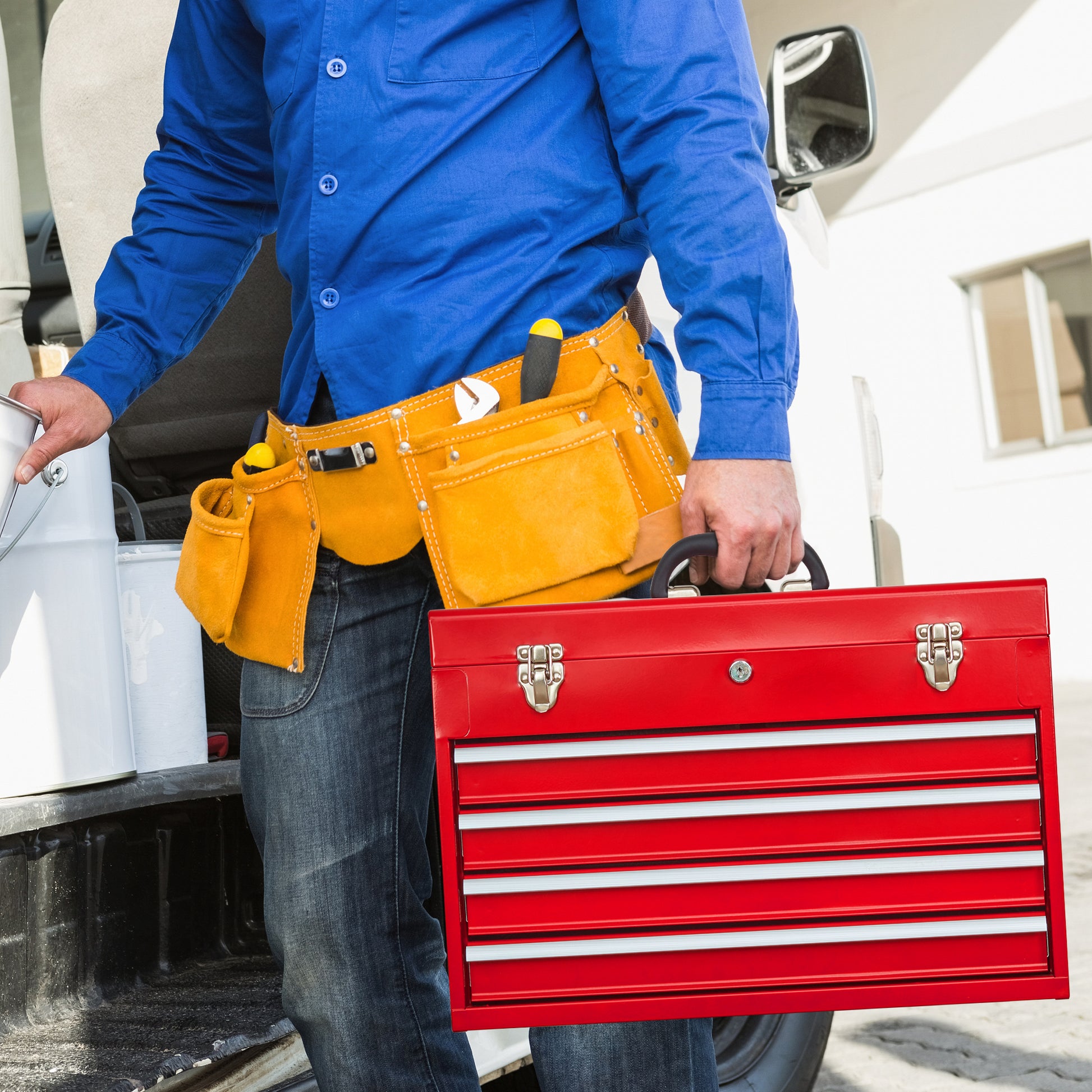 Red metal rolling tool chest with silver handles and latches featuring five drawers