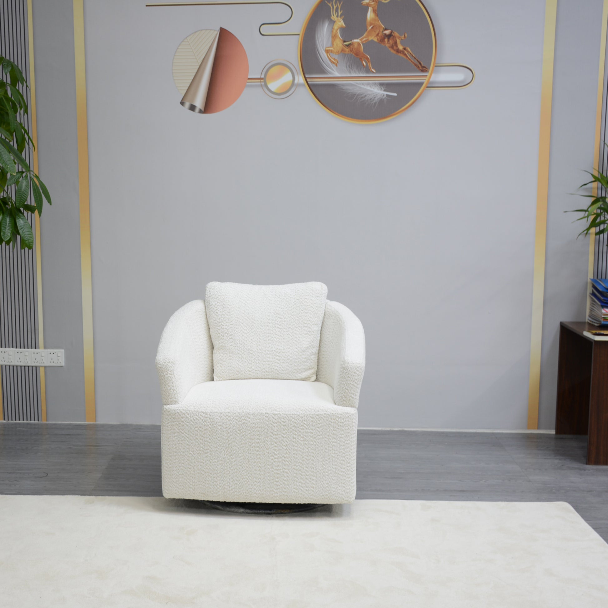 Plush white armchair with swivel base and coordinating throw pillow ideal for living rooms