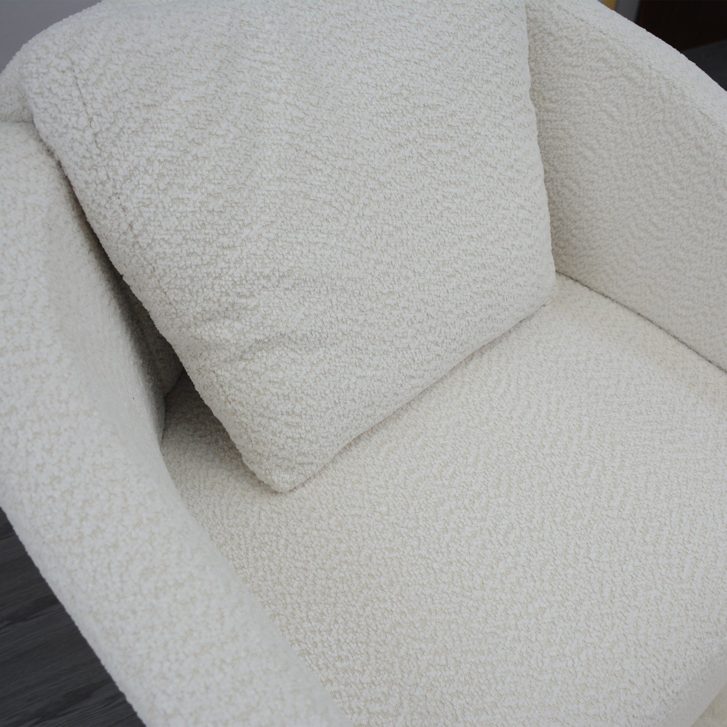 Cozy ivory teddy bear fabric armchair plush textured seat and armrest detail
