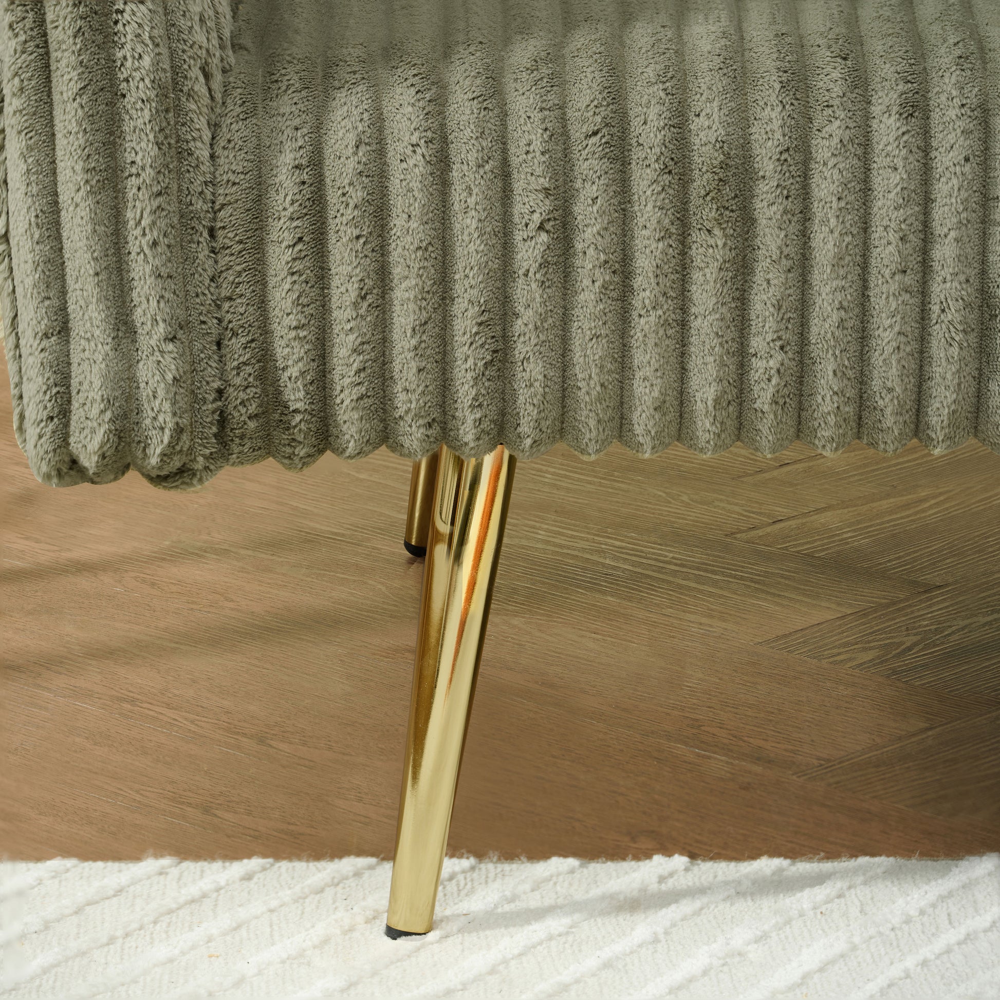 Sage corduroy fabric with scalloped edge detail and brushed gold legs