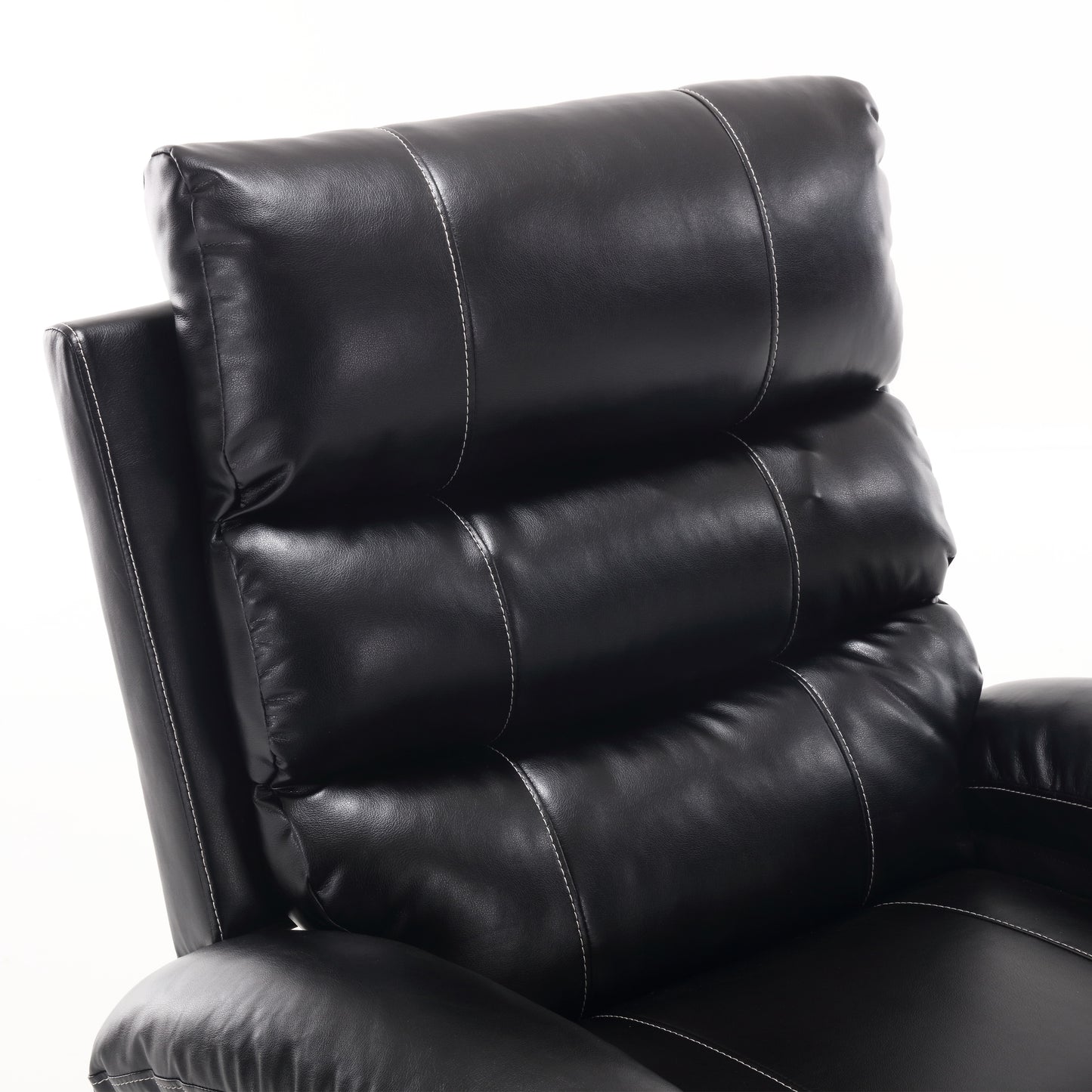 Closeup of a black faux leather recliner headrest with white stitching details
