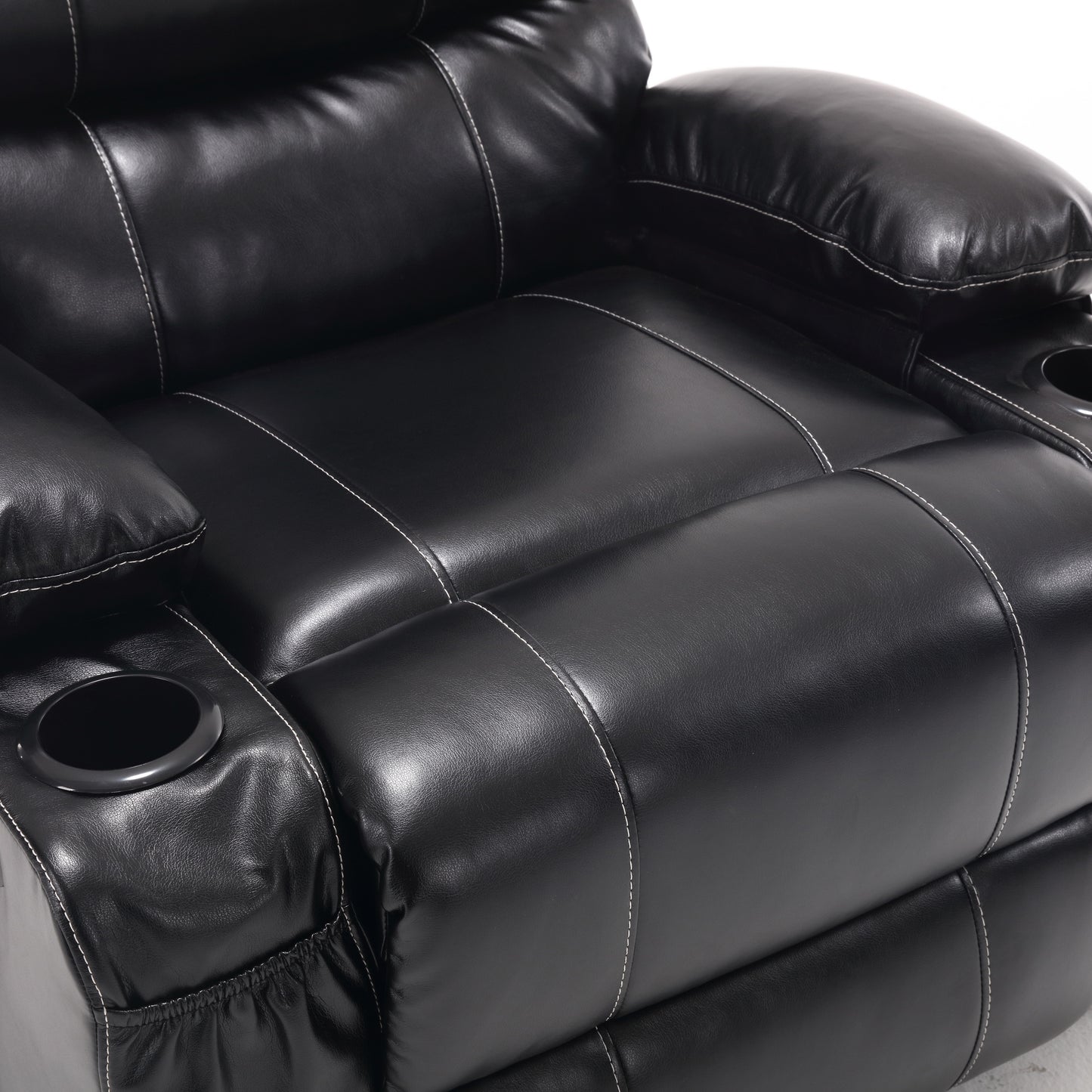 Black leather recliner chair detail with cupholders perfect for home theater