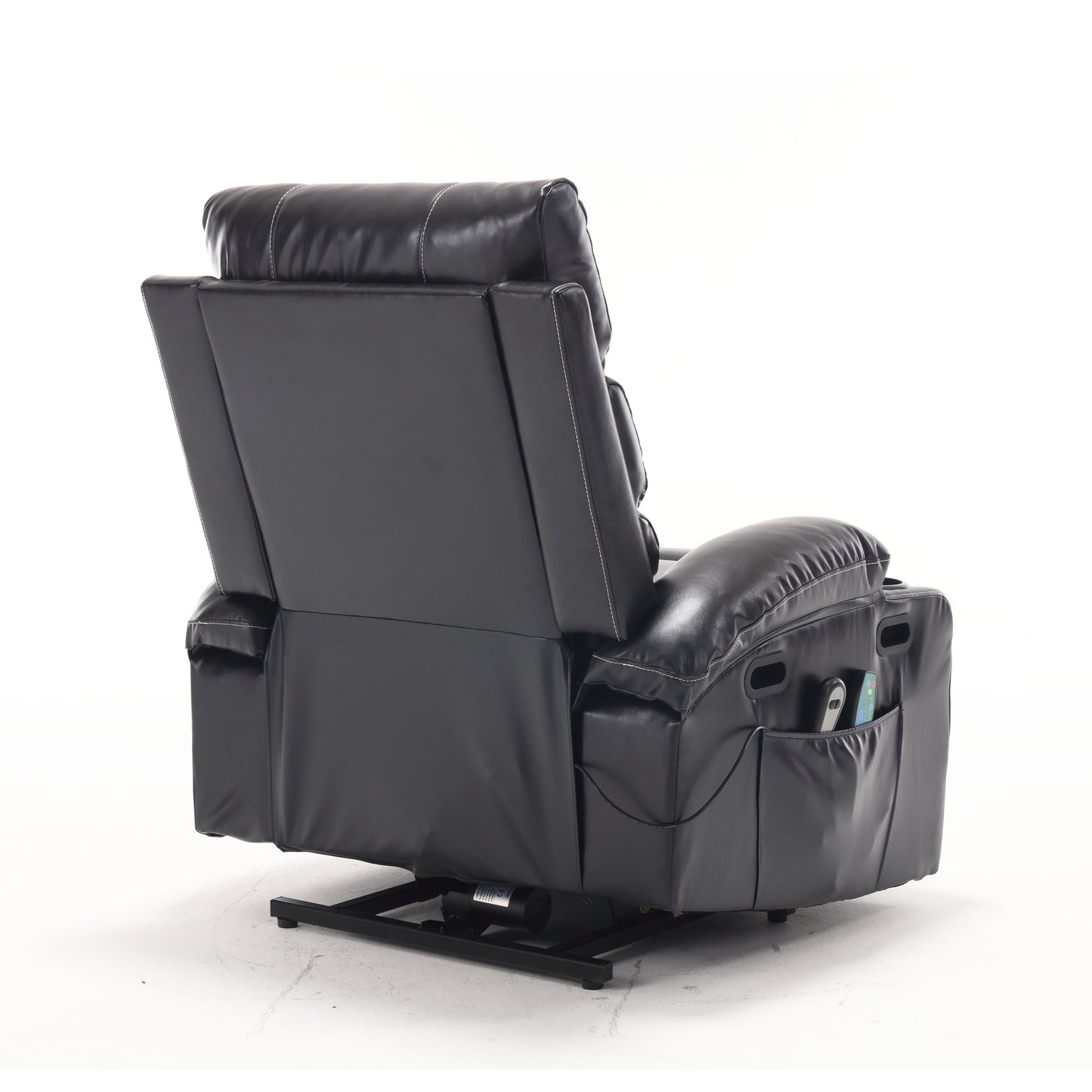 Rear view of a black leather power lift recliner chair with side pocket and remote