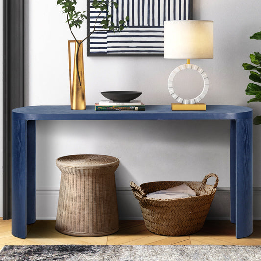 Dark blue curved console table with wood grain texture and modern design