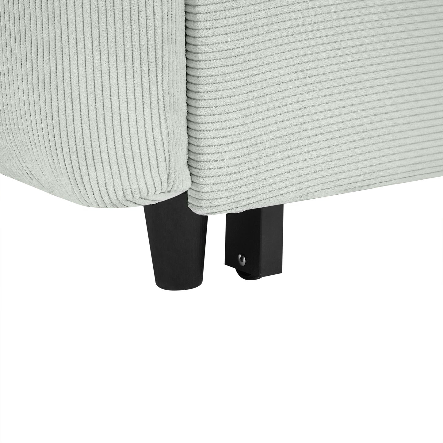 Closeup of pale gray corduroy fabric on a sofa leg with black metal support