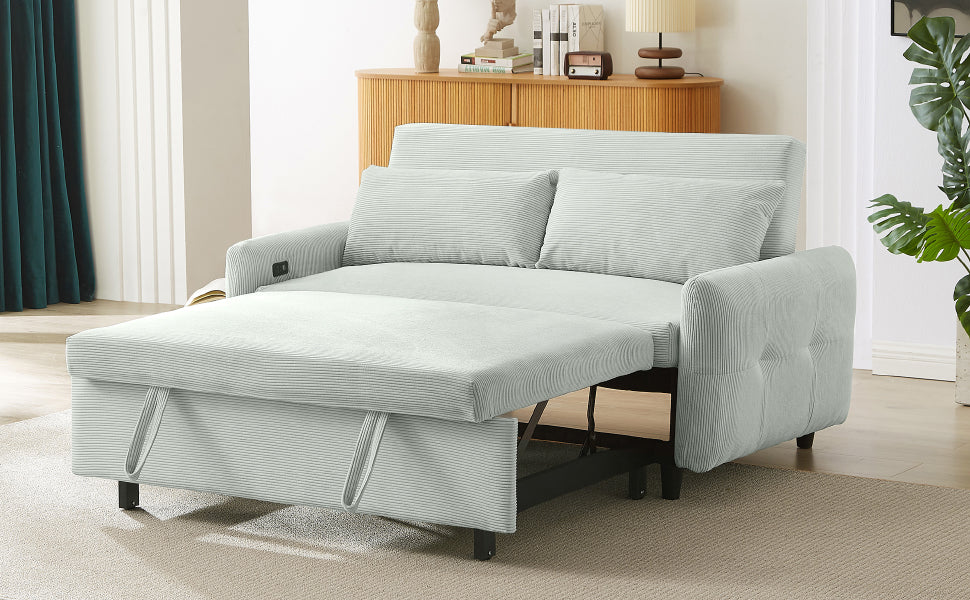 Light blue corduroy sofa bed with pullout chaise and matching pillows